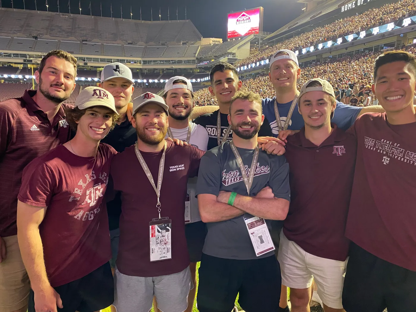 Iron Spikes brothers together on the field at Kyle Field